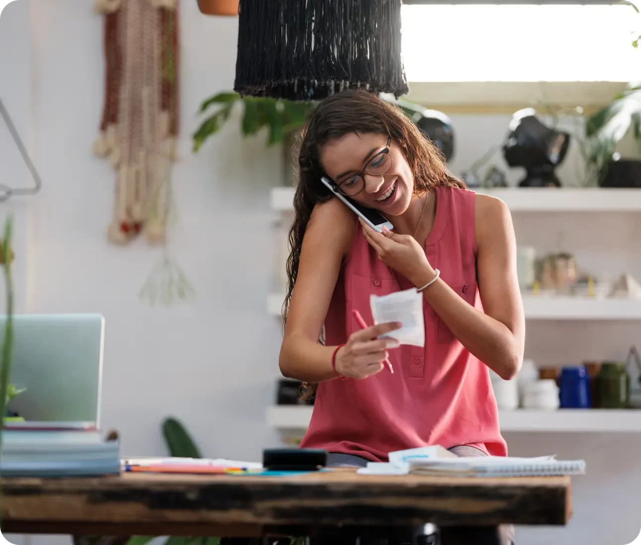 Woman sitting at desk smiling