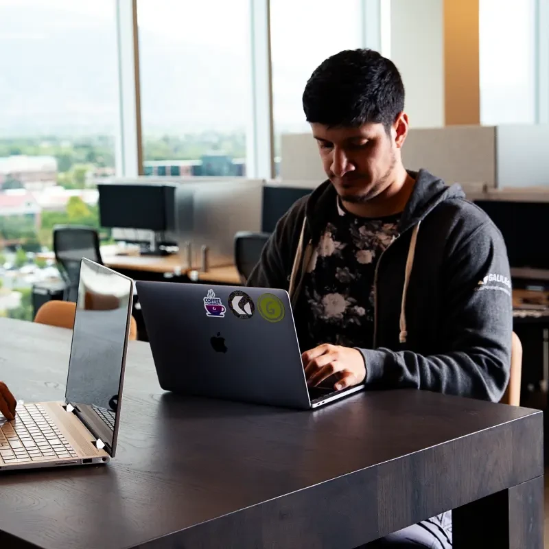 man working at laptop